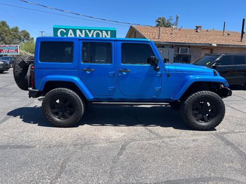 Used 2014 Jeep Wrangler Unlimited Sahara AWD/4WD image 2