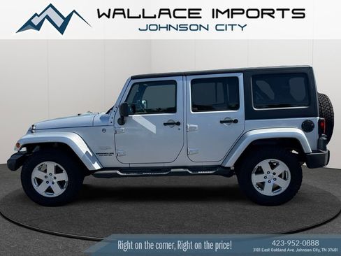 Used 2011 Jeep Wrangler Unlimited Sahara w/ Trailer Tow Group AWD/4WD image 1