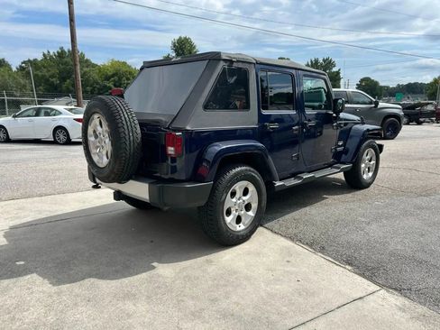 Used 2013 Jeep Wrangler Unlimited Sahara w/ Dual Top Group image 7