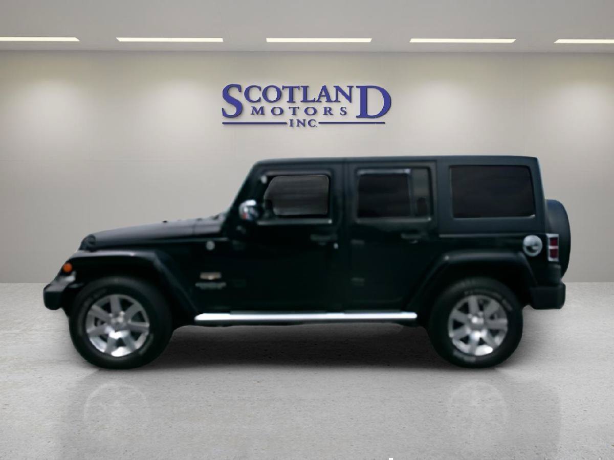 Used 2015 Jeep Wrangler Unlimited Sahara w/ Dual Top Group AWD/4WD image 1