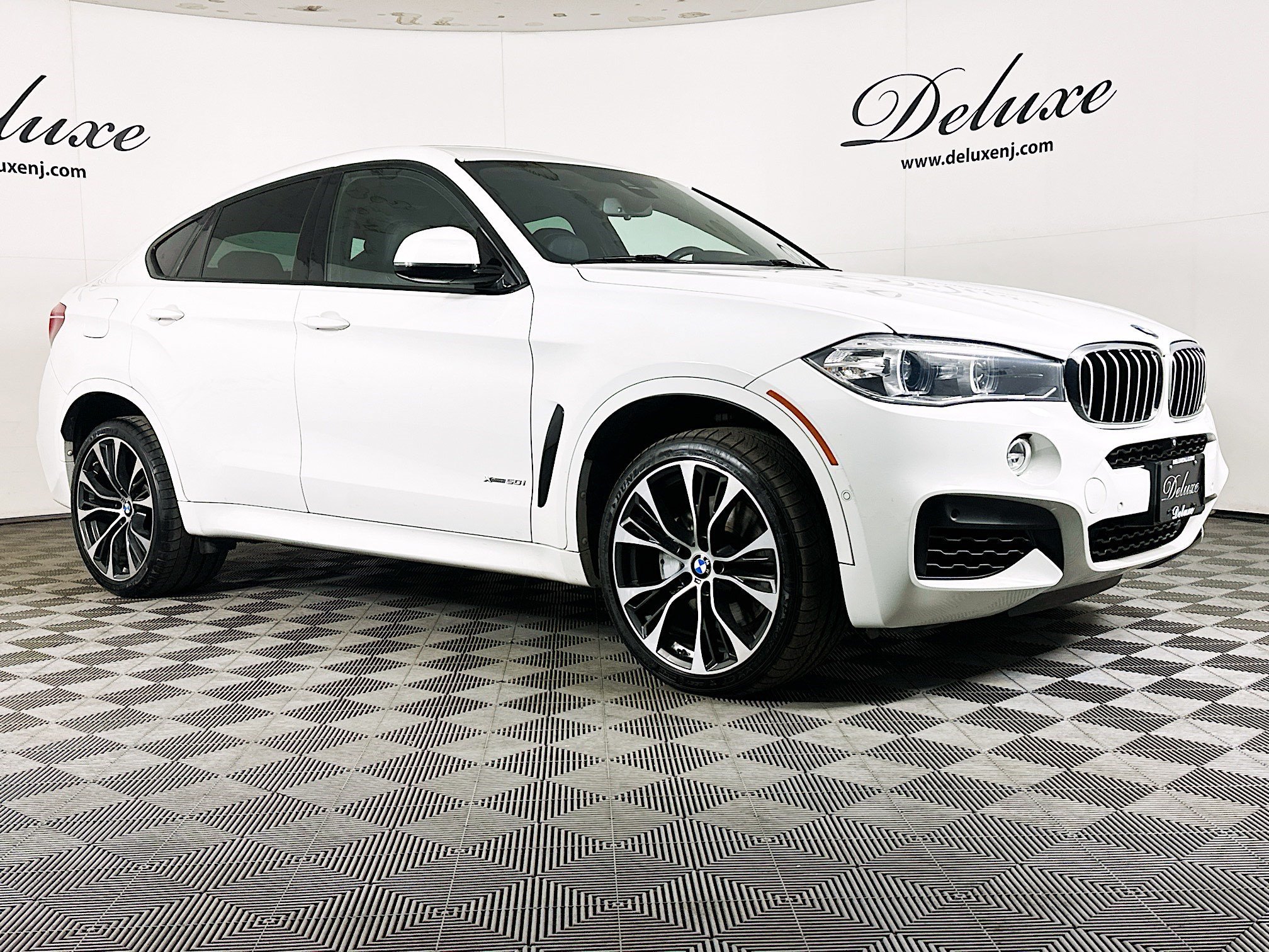 Used 2019 BMW X6 xDrive50i w/ M Sport Package AWD/4WD image 1