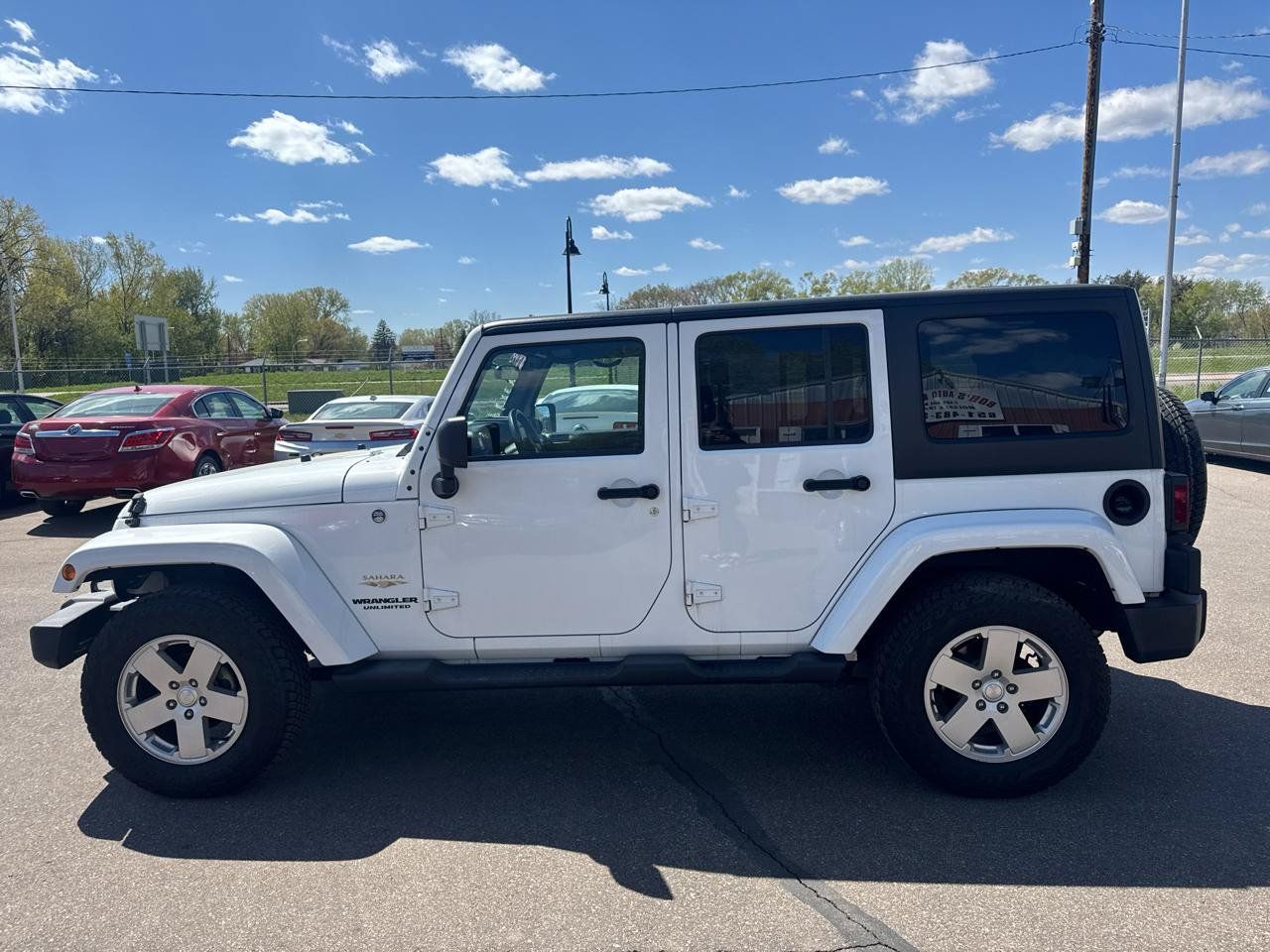 Used 2012 Jeep Wrangler Unlimited Sahara w/ Dual Top Group AWD/4WD image 8