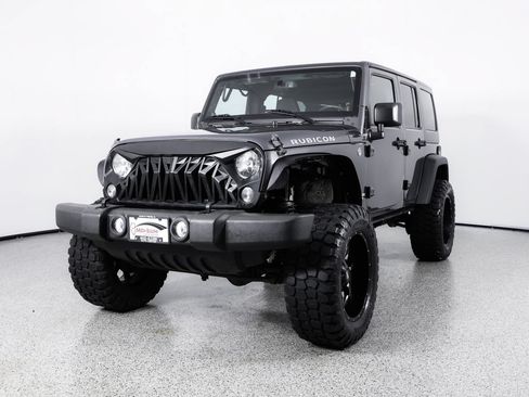 Used 2014 Jeep Wrangler Unlimited Rubicon w/ Dual Top Group AWD/4WD image 3