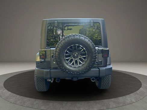 Used 2014 Jeep Wrangler Unlimited Sahara w/ Dual Top Group AWD/4WD image 6