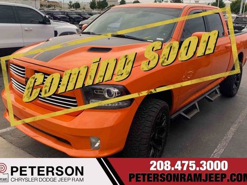 Used 2017 RAM 1500 Sport w/ Ignition Orange Sport Package AWD/4WD image 1