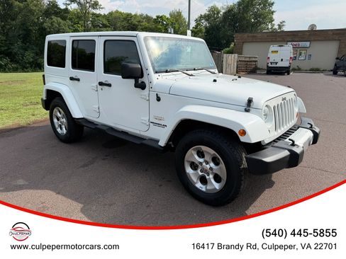 Used 2012 Jeep Wrangler Unlimited Sahara w/ Connectivity Group AWD/4WD image 6