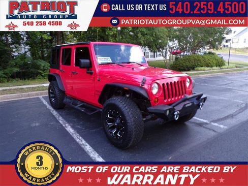 Used 2013 Jeep Wrangler Unlimited Sport AWD/4WD image 1