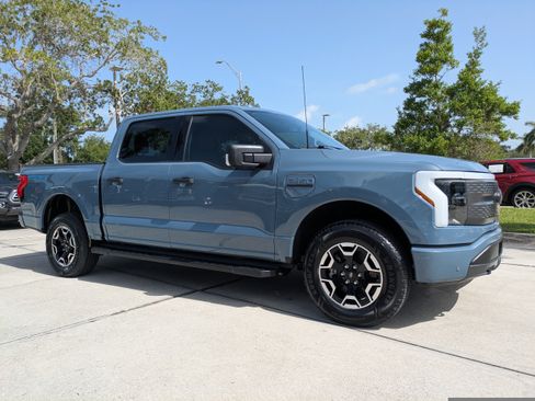 Certified 2023 Ford F150 Lightning XLT w/ Tow Technology Package AWD/4WD image 2