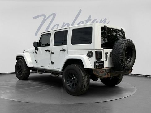 Used 2012 Jeep Wrangler Unlimited Sahara w/ Dual Top Group AWD/4WD image 6