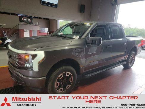 Used 2023 Ford F150 Lightning XLT AWD/4WD image 1