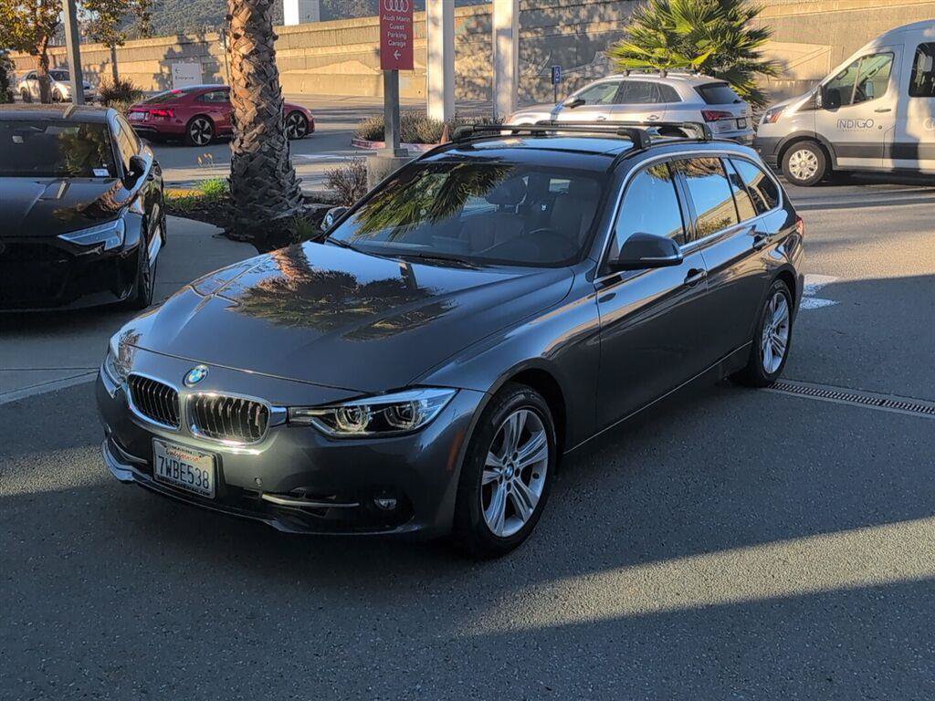 Used 2017 BMW 330i xDrive Wagon AWD/4WD image 1