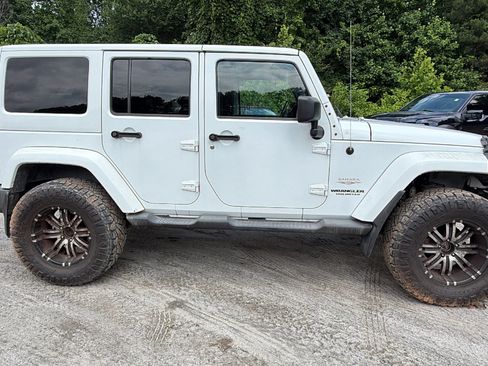 Used 2011 Jeep Wrangler Unlimited Sahara AWD/4WD image 7