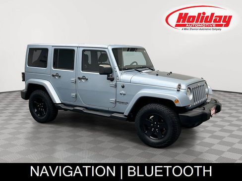 Used 2012 Jeep Wrangler Unlimited Sahara AWD/4WD image 1
