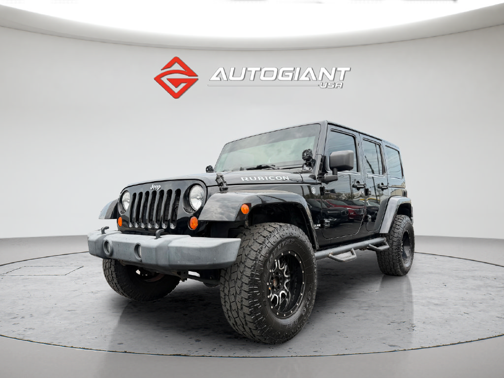 Used 2012 Jeep Wrangler Unlimited Rubicon w/ Dual Top Group AWD/4WD image 2