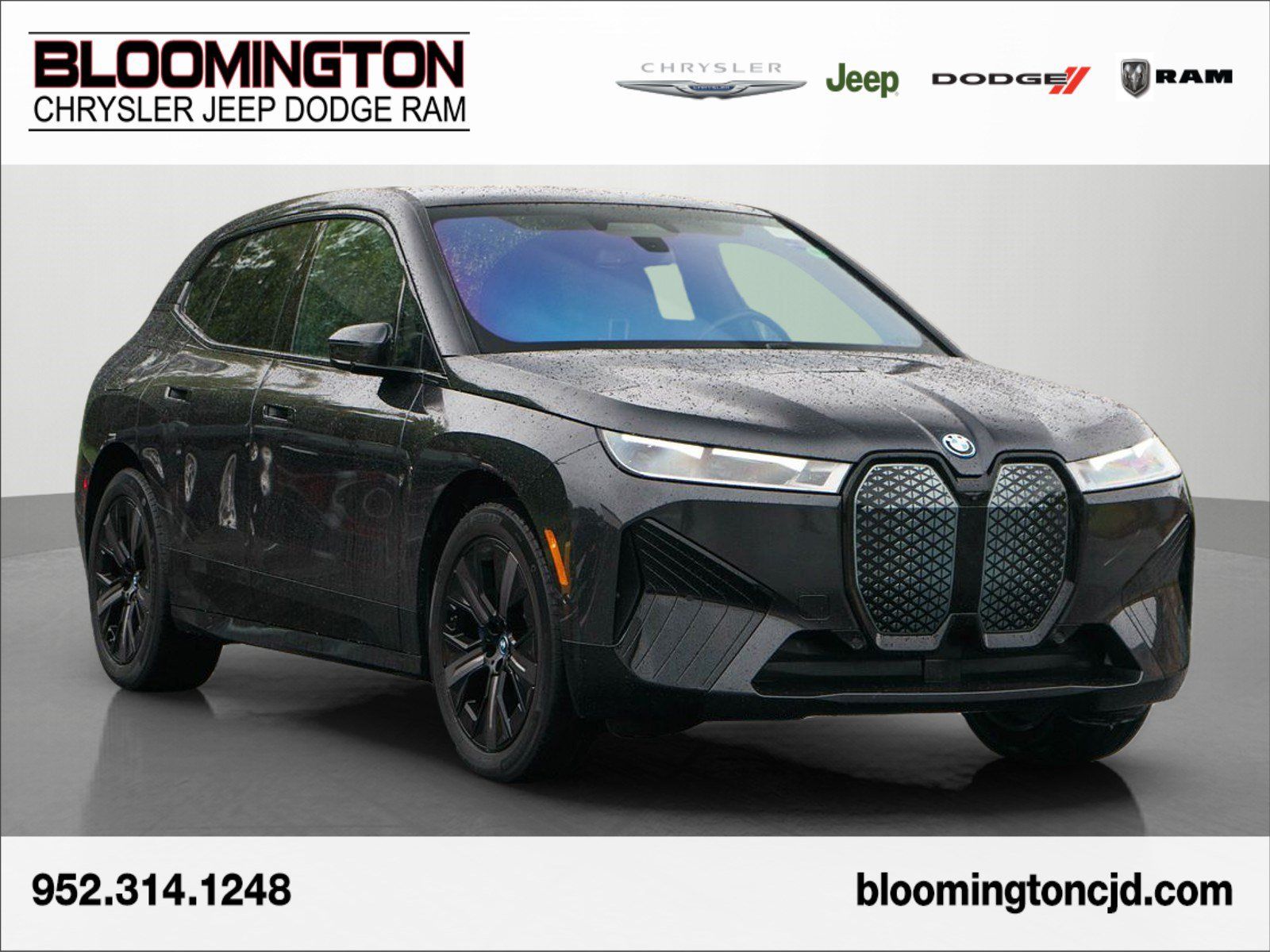 Used 2024 BMW iX xDrive50 w/ Premium Package AWD/4WD image 1
