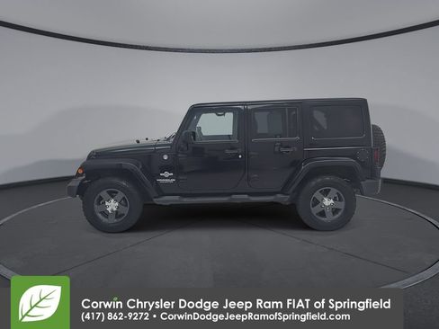Used 2011 Jeep Wrangler Unlimited Sport w/ Connectivity Group AWD/4WD image 9