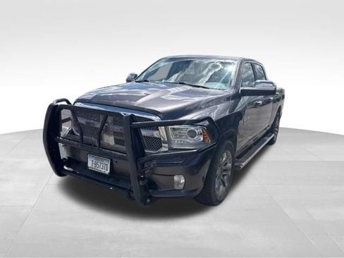 Used 2014 RAM 1500 Limited AWD/4WD image 1