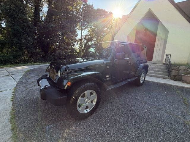 Used 2011 Jeep Wrangler Unlimited Sahara w/ Connectivity Group AWD/4WD image 37
