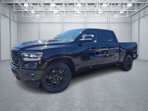 Used 2024 RAM 1500 Laramie AWD/4WD image 1