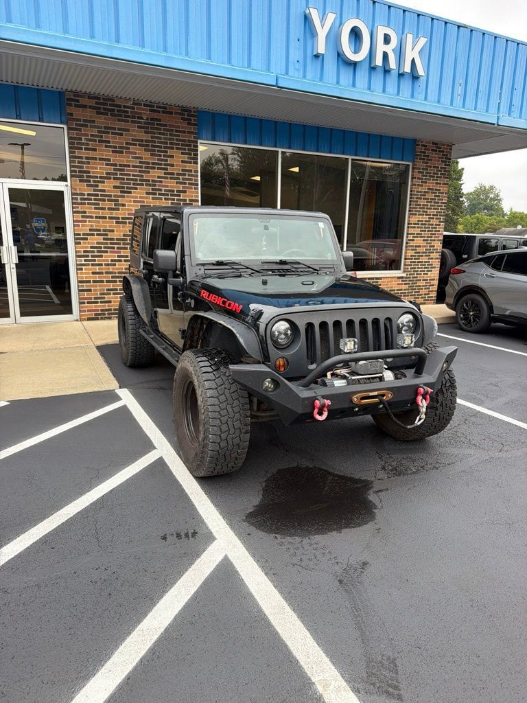 Used 2011 Jeep Wrangler Unlimited Rubicon w/ Dual Top Group AWD/4WD image 3