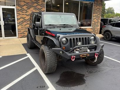Used 2011 Jeep Wrangler Unlimited Rubicon w/ Dual Top Group