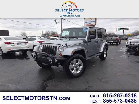 Used 2013 Jeep Wrangler Unlimited Sahara w/ Dual Top Group image 1