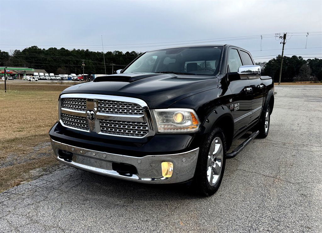 Used 2015 RAM 1500 Laramie AWD/4WD image 1