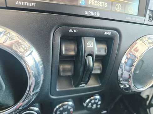 Used 2014 Jeep Wrangler Unlimited Sahara w/ Dual Top Group AWD/4WD image 27