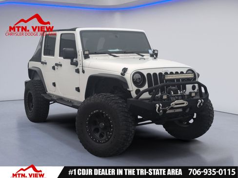 Used 2012 Jeep Wrangler Unlimited Sport image 1