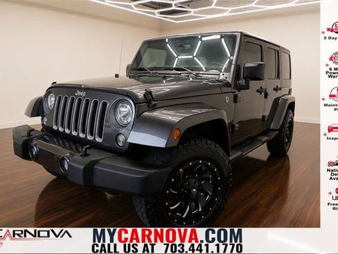Used 2017 Jeep Wrangler Unlimited Sahara w/ Connectivity Group AWD/4WD image 1