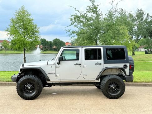 Used 2012 Jeep Wrangler Unlimited Sport image 1