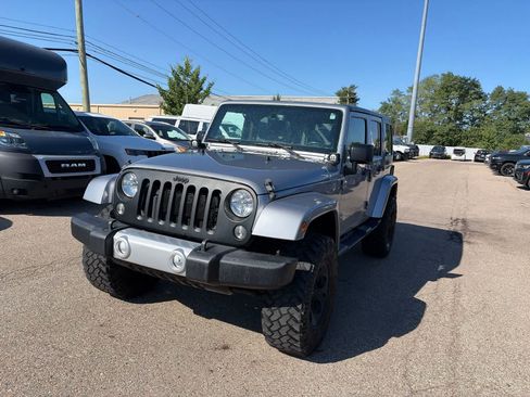 Certified 2016 Jeep Wrangler Unlimited Sahara w/ Connectivity Group AWD/4WD image 1