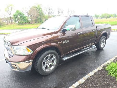 Used 2014 RAM 1500 Laramie AWD/4WD image 1