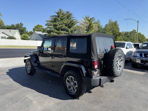 Used 2014 Jeep Wrangler Unlimited Rubicon w/ Dual Top Group AWD/4WD image 3