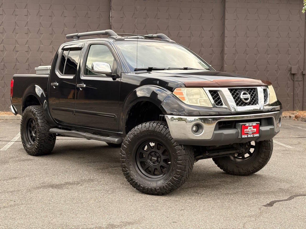 Used 2011 Nissan Frontier SL RWD image 2
