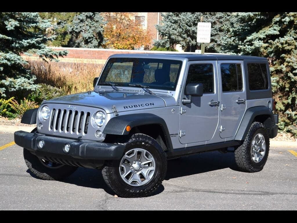 Used 2015 Jeep Wrangler Unlimited Rubicon w/ Dual Top Group AWD/4WD image 1