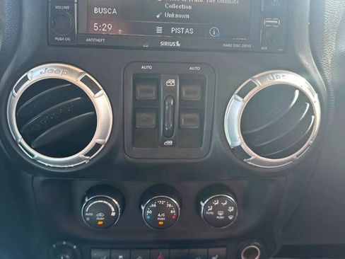 Used 2015 Jeep Wrangler Unlimited Sahara w/ Dual Top Group AWD/4WD image 10