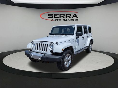 Used 2015 Jeep Wrangler Unlimited Sahara AWD/4WD image 1