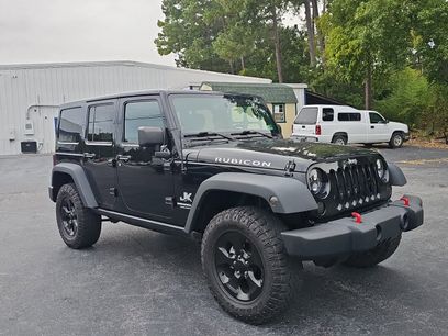 Used 2014 Jeep Wrangler Unlimited Rubicon w/ Dual Top Group
