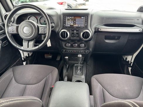 Used 2014 Jeep Wrangler Unlimited Rubicon w/ Dual Top Group AWD/4WD image 11