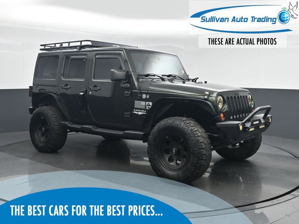 Used 2012 Jeep Wrangler Unlimited Sahara AWD/4WD image 1