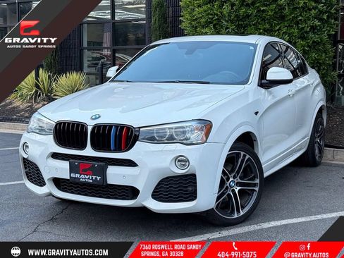Used 2016 BMW X4 xDrive28i AWD/4WD image 1
