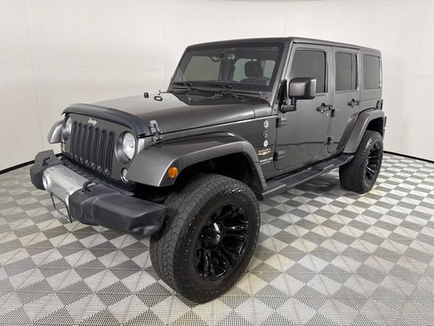 Used 2014 Jeep Wrangler Unlimited Sahara w/ Max Tow Package AWD/4WD image 9