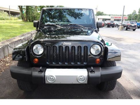 Used 2012 Jeep Wrangler Unlimited Sahara w/ Dual Top Group AWD/4WD image 2
