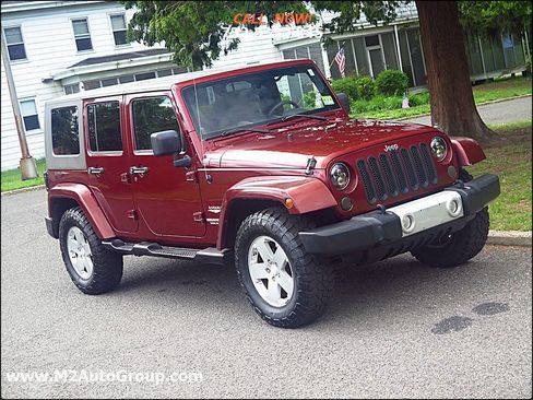 Used 2010 Jeep Wrangler Unlimited Sahara w/ Dual Top Group image 32