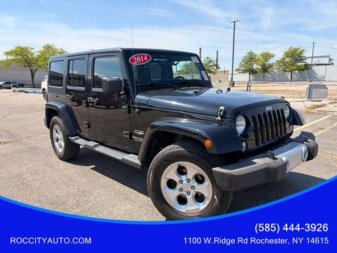 Used 2014 Jeep Wrangler Unlimited Sahara w/ Dual Top Group AWD/4WD image 1
