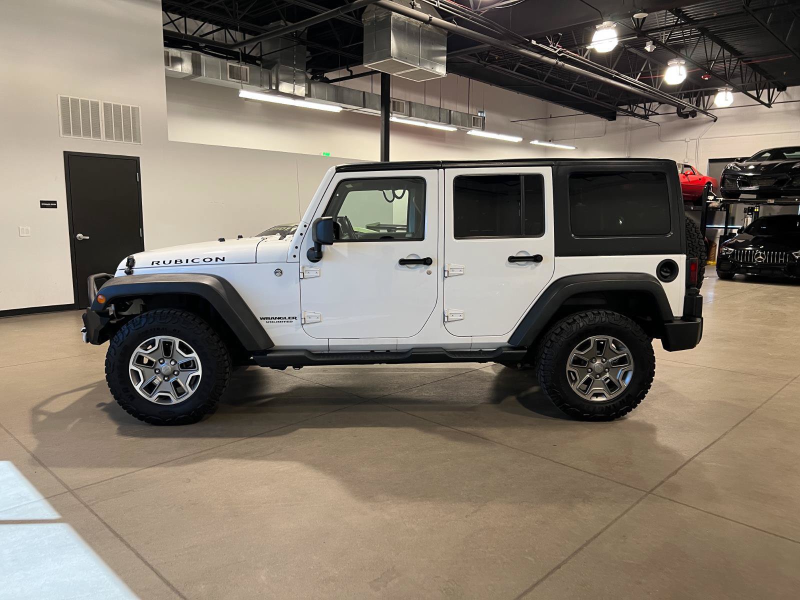 Used 2014 Jeep Wrangler Unlimited Rubicon w/ Dual Top Group AWD/4WD image 6