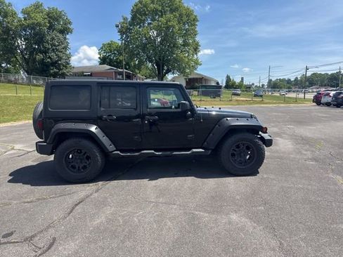 Used 2013 Jeep Wrangler Unlimited Sahara w/ Dual Top Group AWD/4WD image 2