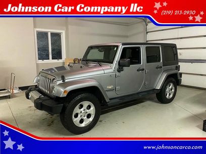 Used 2014 Jeep Wrangler Unlimited Sahara w/ Dual Top Group