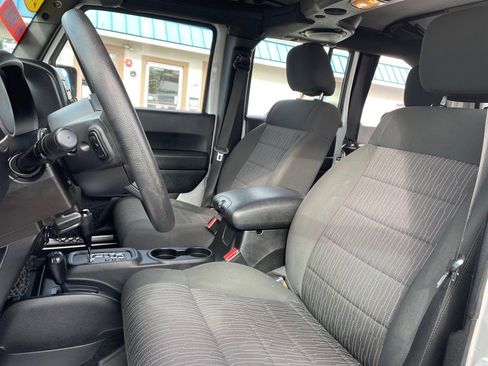 Used 2012 Jeep Wrangler Unlimited Sport w/ Black Appearance Group image 18